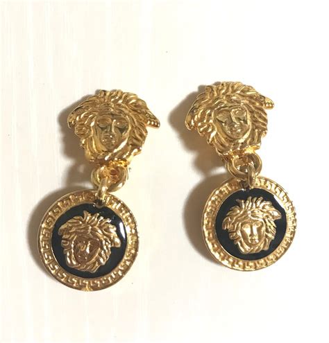 versace dangle earrings.